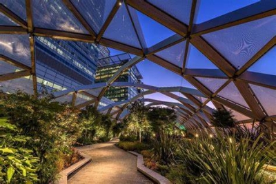 Stroll along the river and docks, around the art and gardens of Canary Wharf